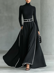 Vestido Maxi Preto com Costuras Brancas, Gola Subida, Mangas Compridas e Corte Justo