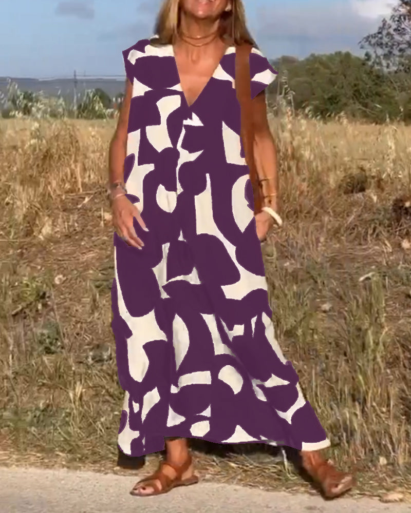Elowen - Unregelmäßiges ärmelloses Kleid mit geometrischem Druck