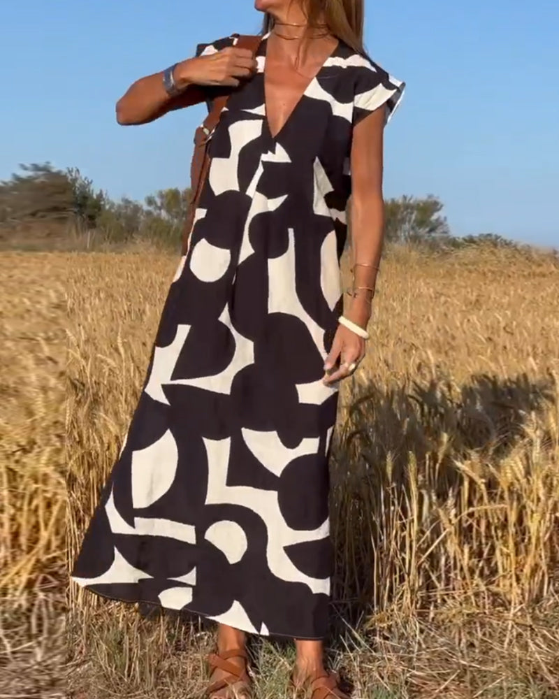 Elowen - Unregelmäßiges ärmelloses Kleid mit geometrischem Druck