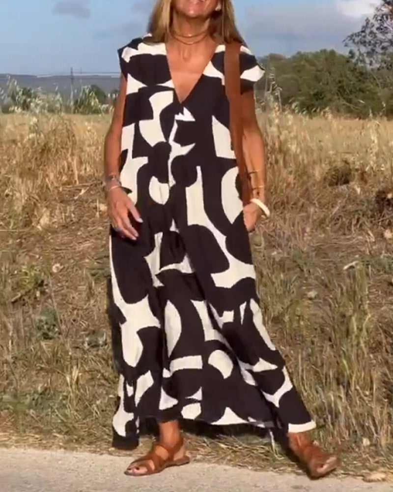 Elowen - Unregelmäßiges ärmelloses Kleid mit geometrischem Druck