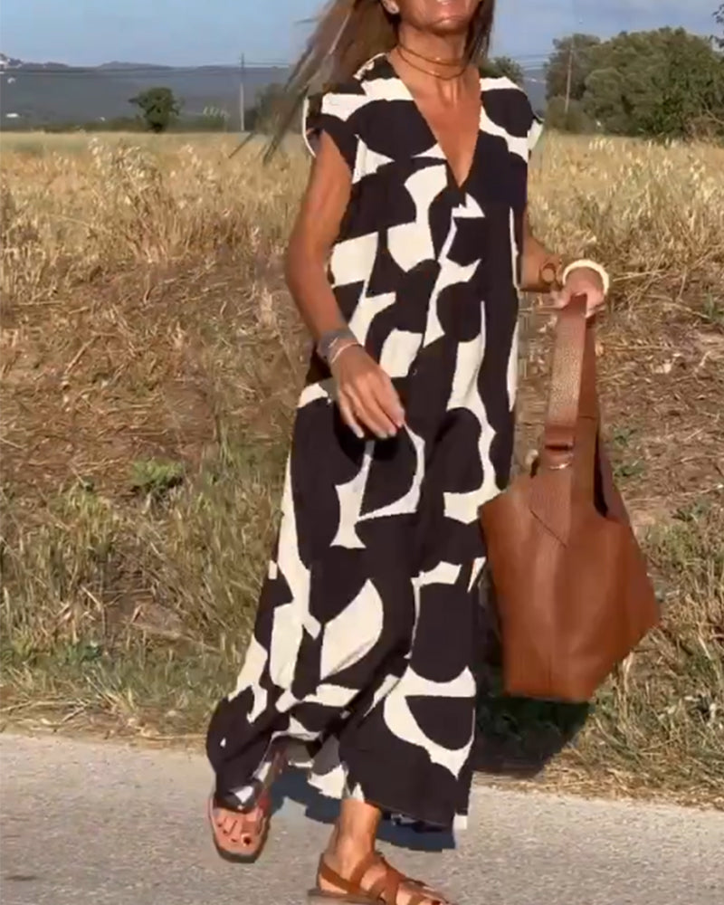 Elowen - Unregelmäßiges ärmelloses Kleid mit geometrischem Druck