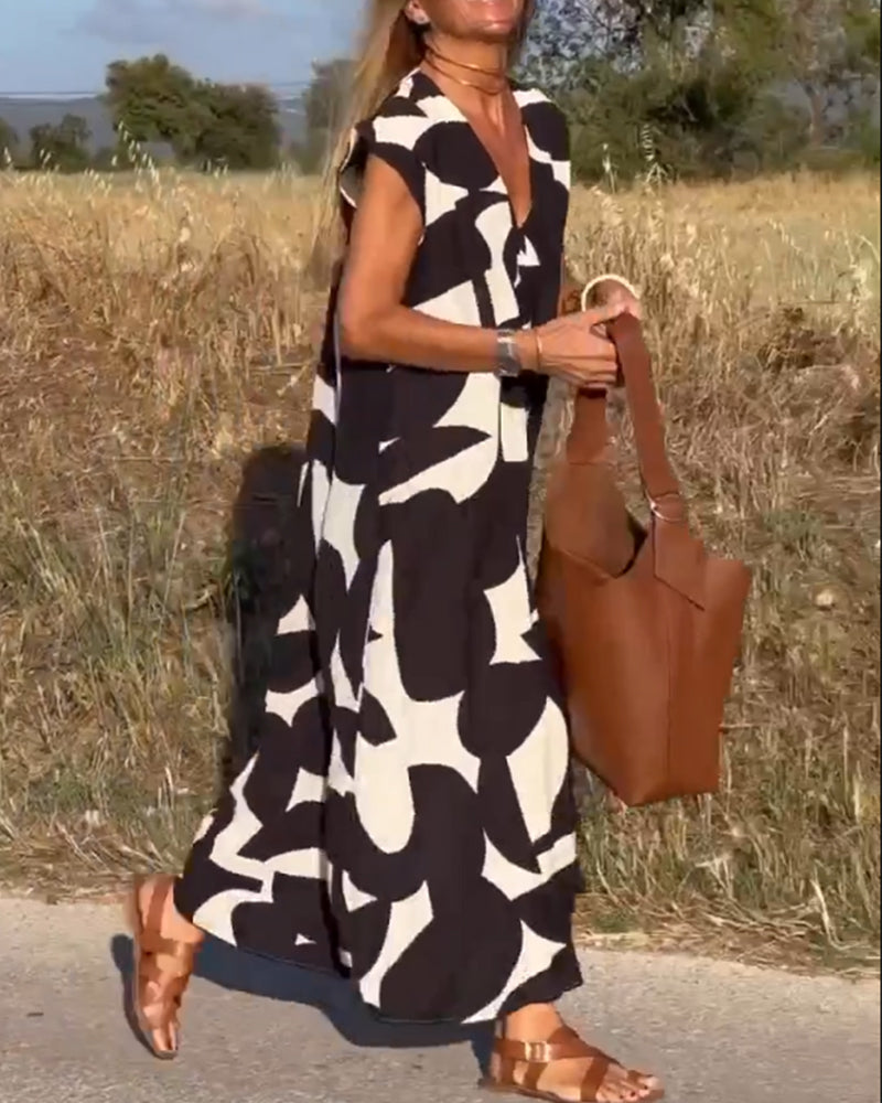 Elowen - Unregelmäßiges ärmelloses Kleid mit geometrischem Druck