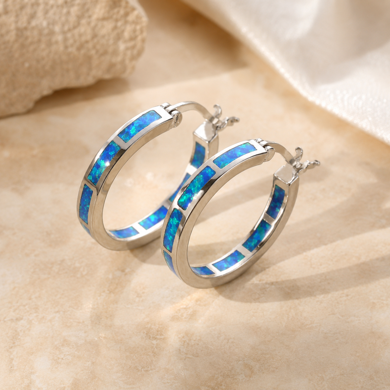 Brincos chic circulares com opala de fogo azul