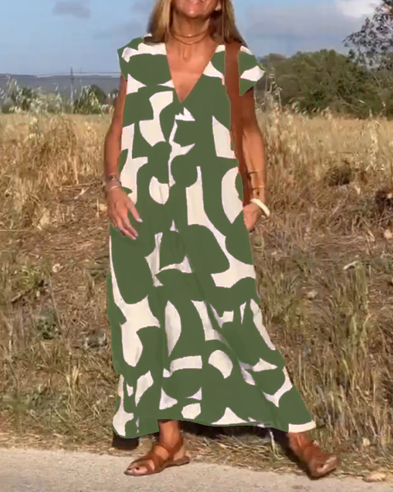 Elowen - Unregelmäßiges ärmelloses Kleid mit geometrischem Druck