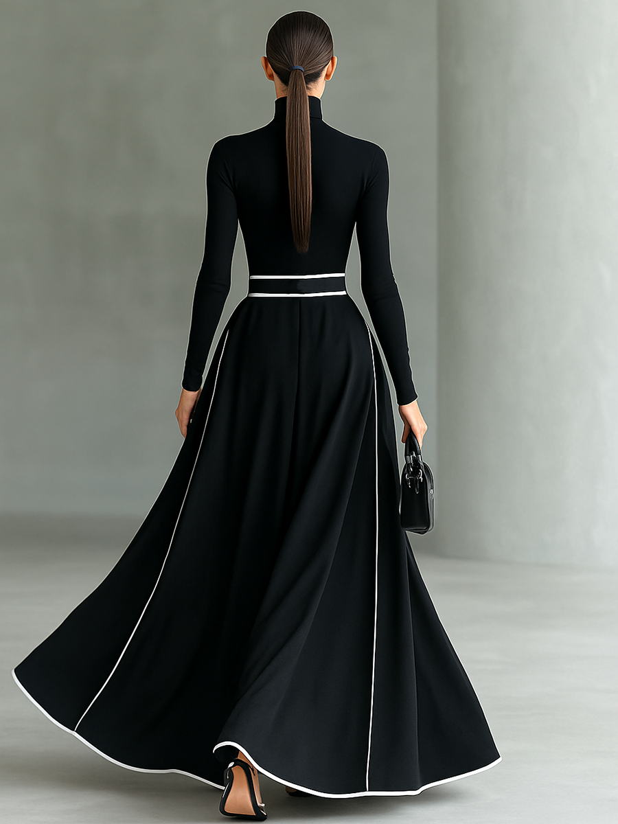 Vestido Maxi Preto com Costuras Brancas, Gola Subida, Mangas Compridas e Corte Justo