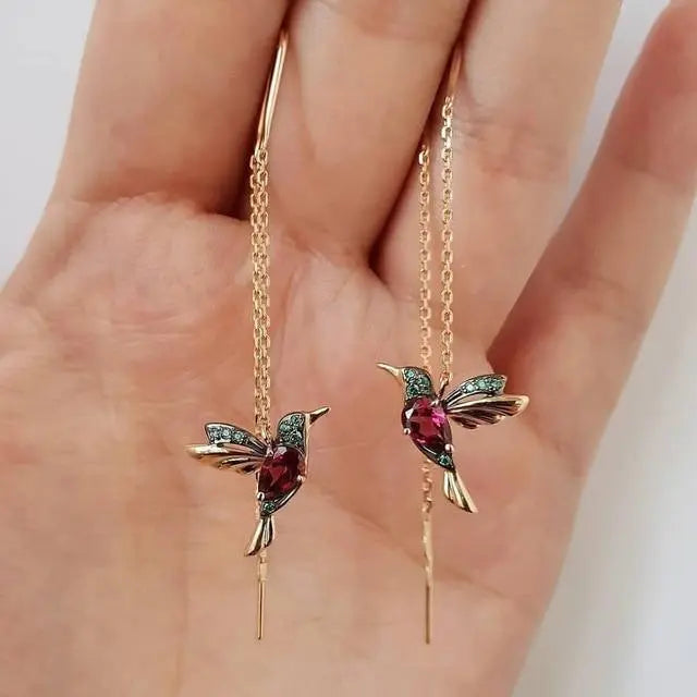 Brincos de fio com colibri em ouro e cristais